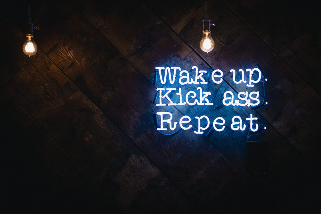 Wake Up, Kiss Ass, and Repeat: The Business Success Mantra